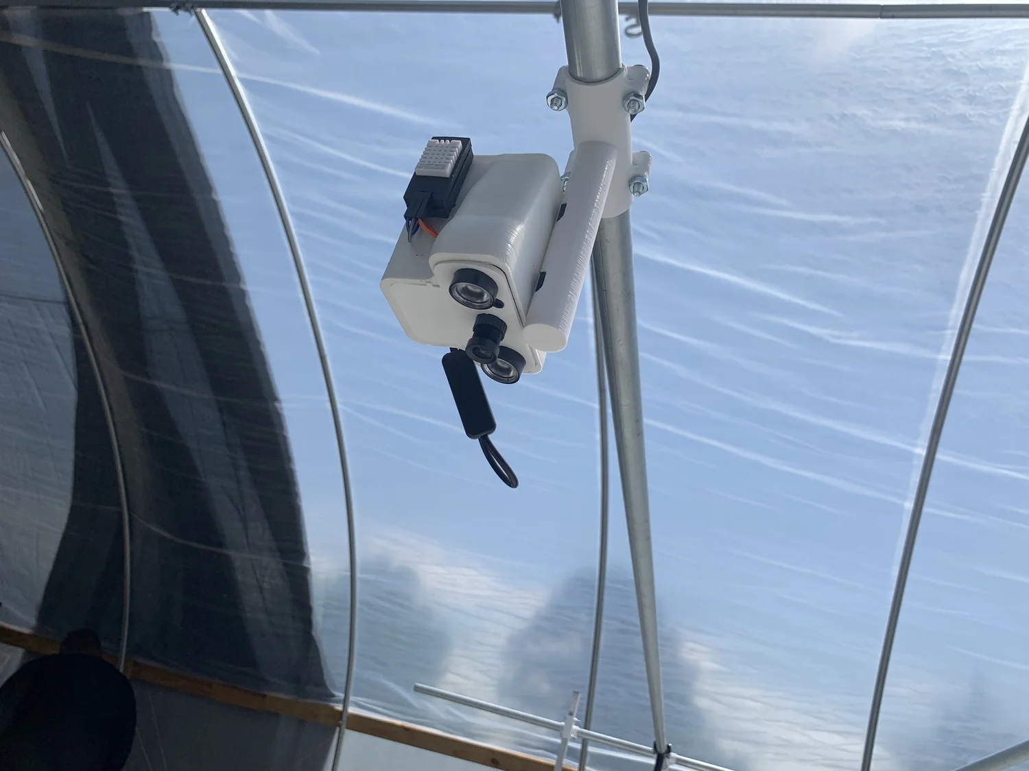 Underside of a Serra Farmcam showing the lens and IR array